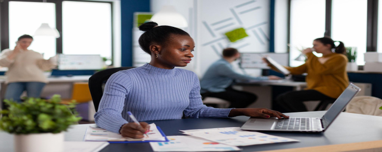 African professional developing her career in her current workplace